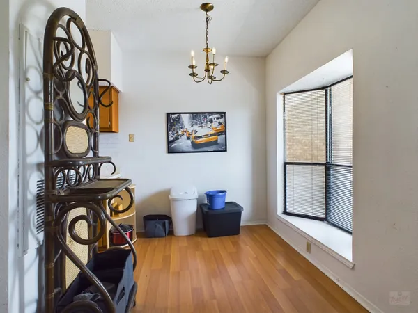 a view of a hallway with washer and dryer