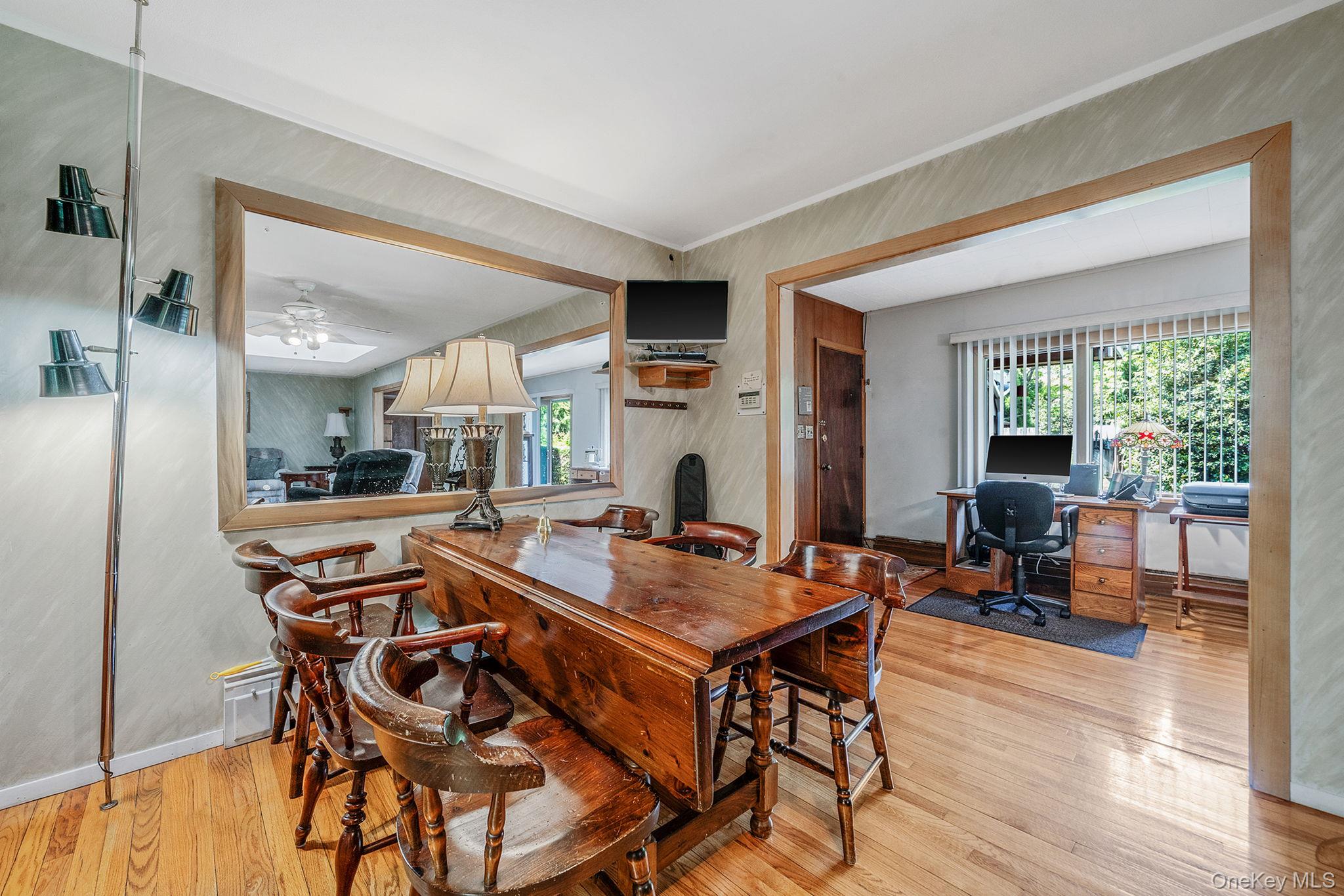280 Deforest Road North Dix Hills, NY 11746 - Photo 18 of 37 a view of a dining room with furniture and wooden floor