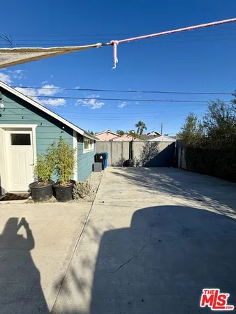 a view of a backyard of a house