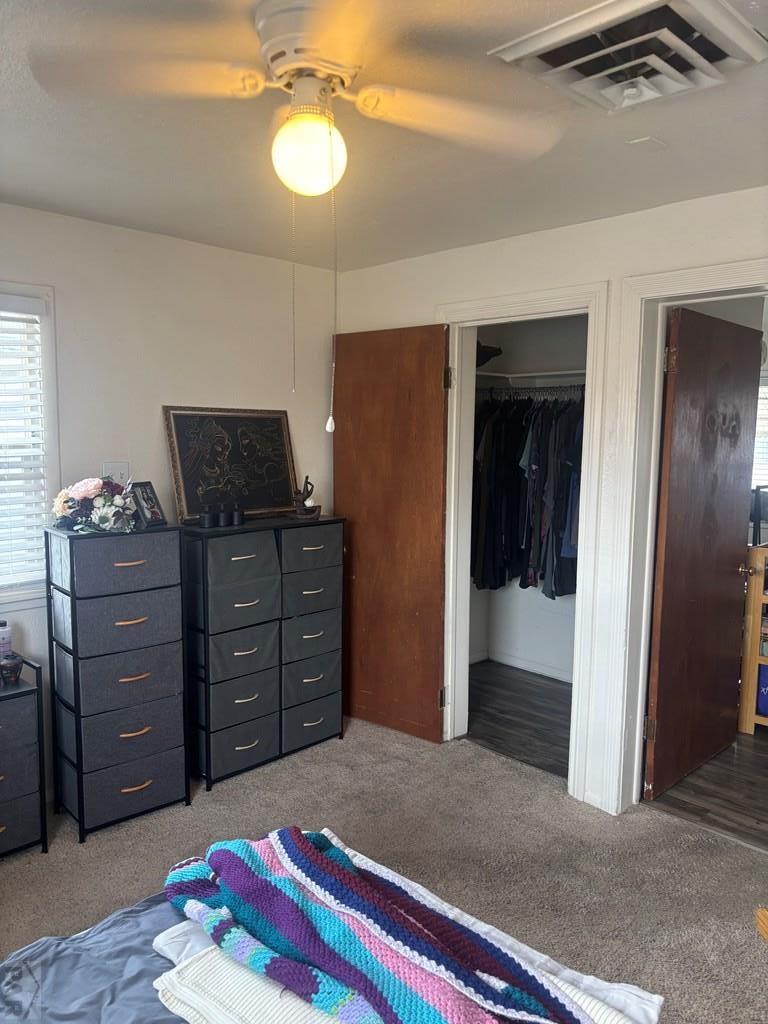 113 West Routt Avenue Pueblo, CO 81004 - Photo 13 of 20 a bedroom with a bed and furniture
