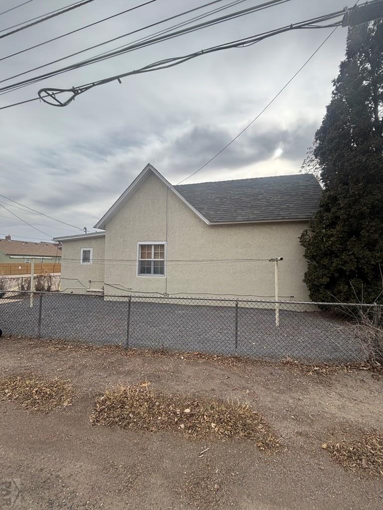 113 West Routt Avenue Pueblo, CO 81004 - Photo 7 of 20 a view of a house with a yard