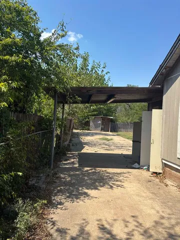a view of a bathtub and an outdoor space