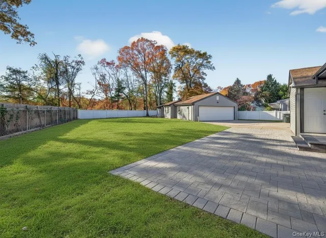 a view of a park with large trees