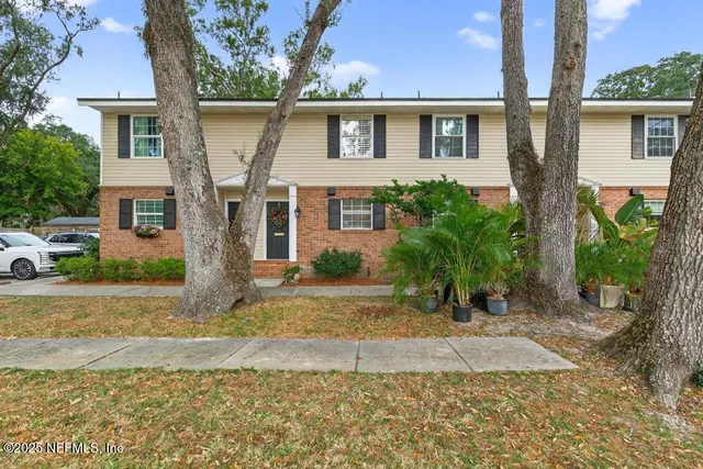 a kitchen with stainless steel appliances granite countertop a stove and a microwave