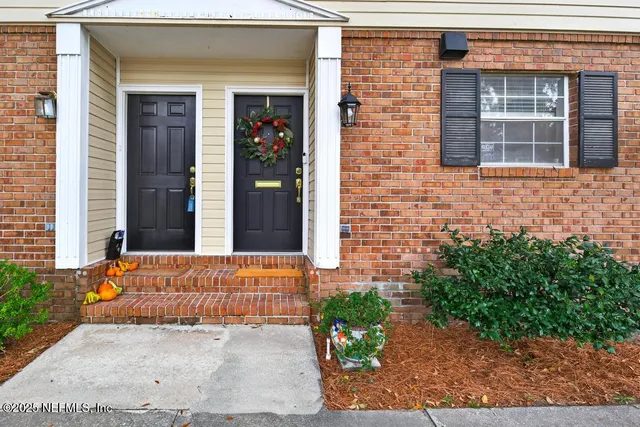 a kitchen with stainless steel appliances a sink stove and refrigerator