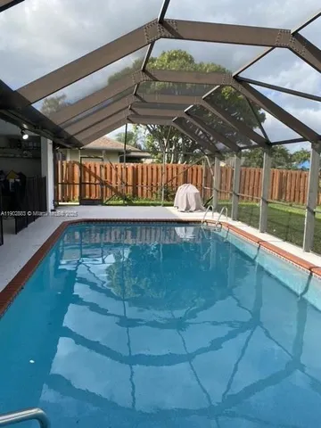 a view of a lake with a yard