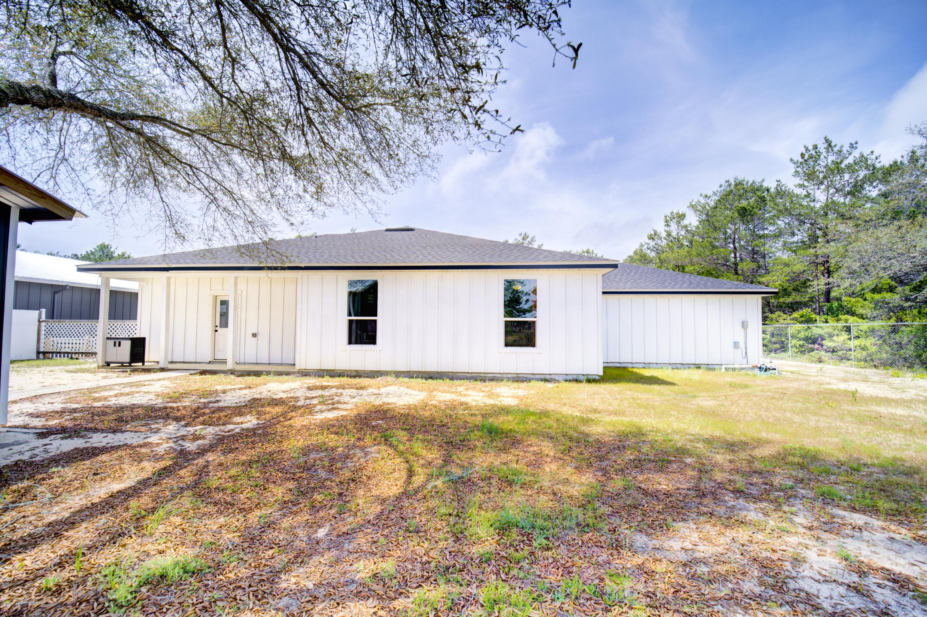 2734 Jewell Road Navarre, FL 32566 - Photo 9 of 32 Back View