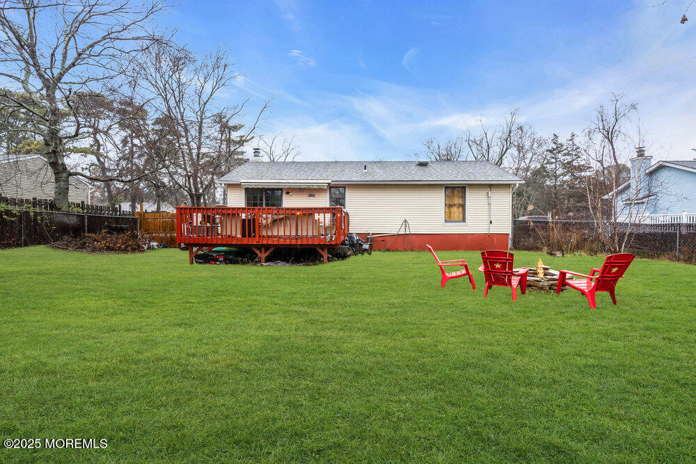 6 Mizzen Way Waretown, NJ 08758 - Photo 11 of 12 a front view of house with yard outdoor seating and green space