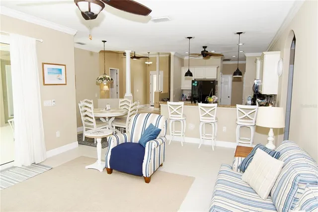a kitchen with a sink a stove and cabinets