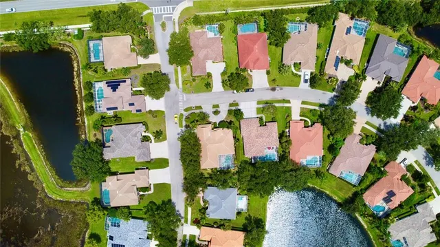 a kitchen with a table chairs and a kitchen