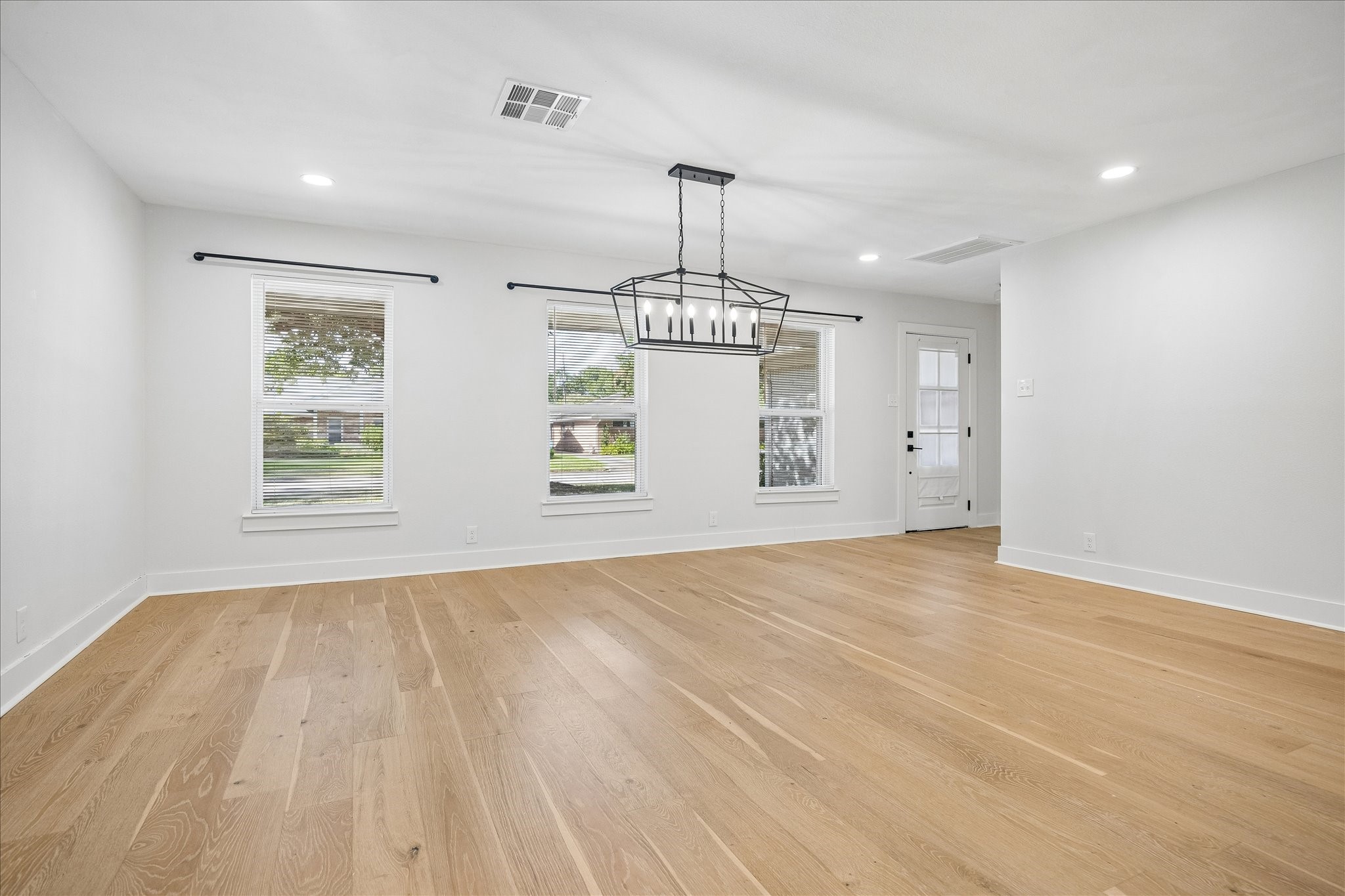 4725 Spellman Road Houston, TX 77035 - Photo 8 of 22 Another view of open concept dining with green views of mature trees.