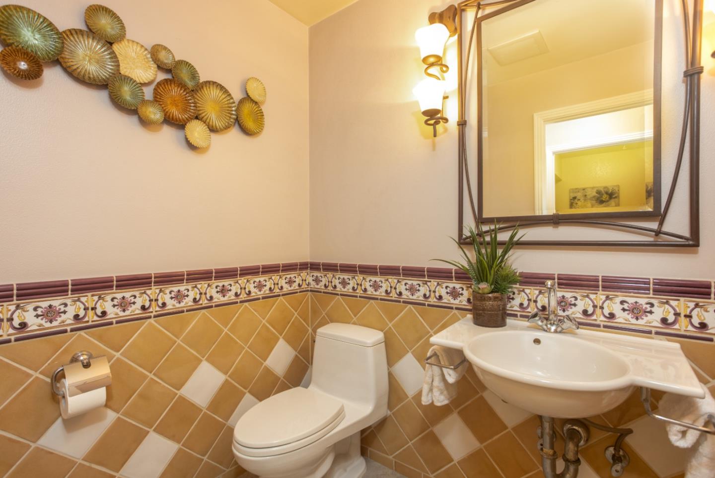 360 Apricot Lane Mountain View, CA 94040 - Photo 16 of 25 a bathroom with a sink mirror vanity and toilet