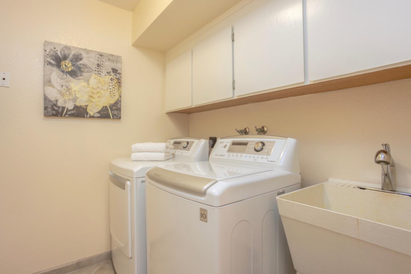 360 Apricot Lane Mountain View, CA 94040 - Photo 18 of 25 a utility room with dryer and washer