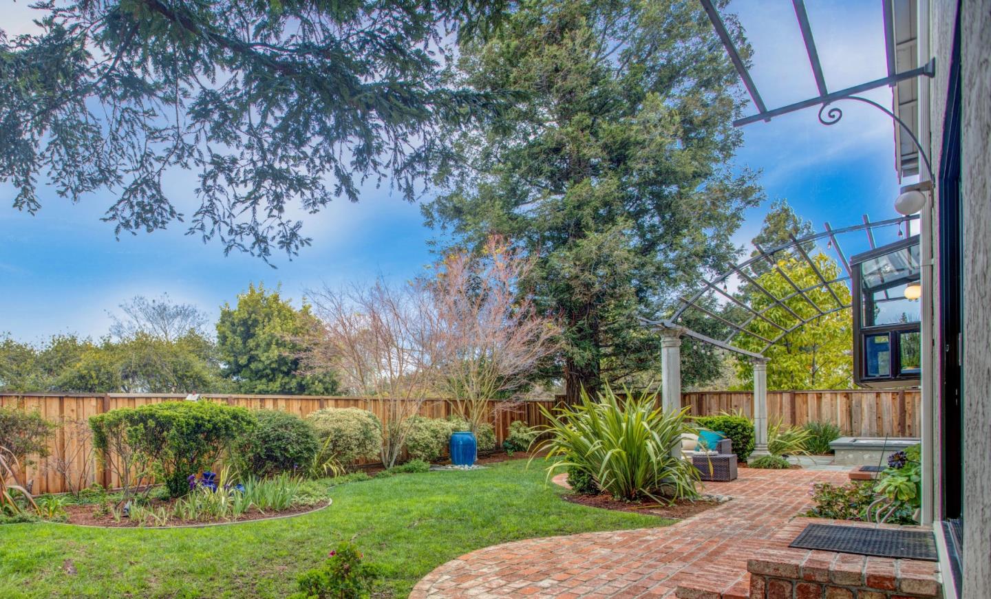 360 Apricot Lane Mountain View, CA 94040 - Photo 21 of 25 a view of a garden with a lake