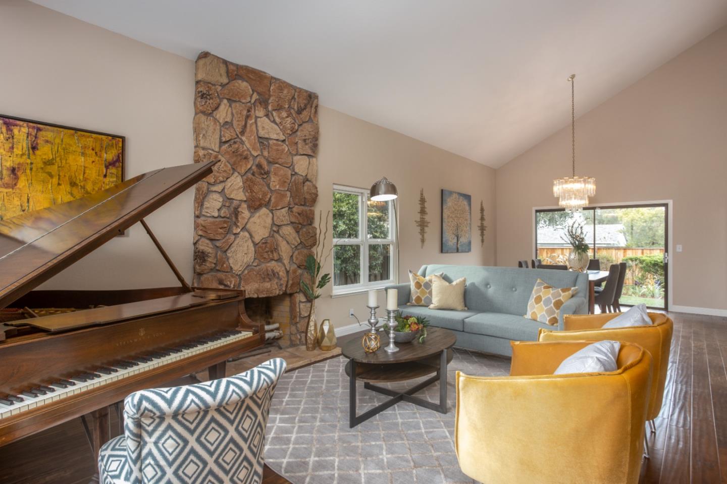 360 Apricot Lane Mountain View, CA 94040 - Photo 3 of 25 a living room with furniture and a flat screen tv