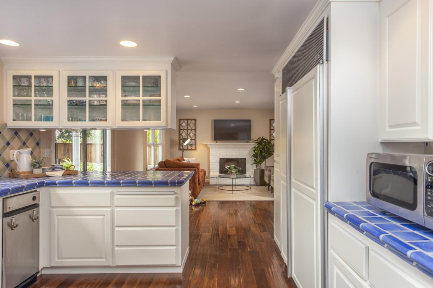 360 Apricot Lane Mountain View, CA 94040 - Photo 7 of 25 a kitchen view with granite countertop a stove and a refrigerator