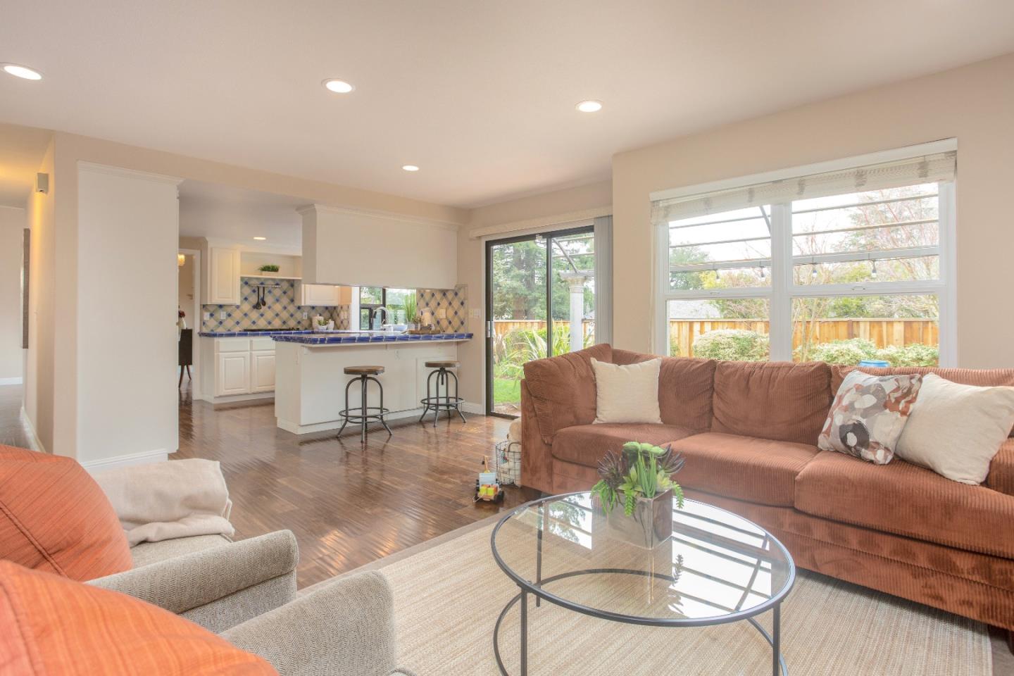 360 Apricot Lane Mountain View, CA 94040 - Photo 8 of 25 a living room with furniture and a large window