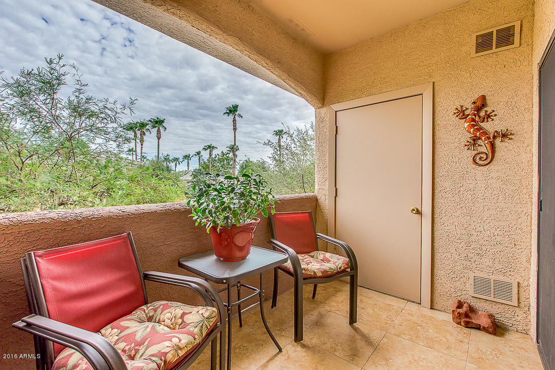 10030 West Indian School Road, Unit 269 Phoenix, AZ 85037 - Photo 24 of 34 a outdoor living space with furniture and a potted plant