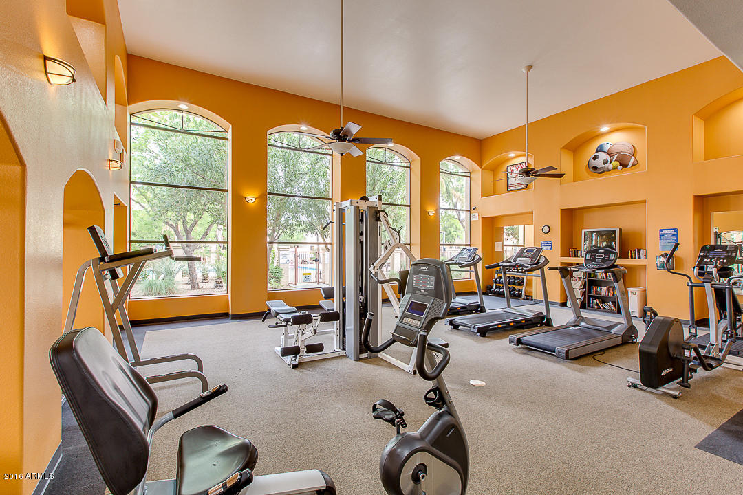 10030 West Indian School Road, Unit 269 Phoenix, AZ 85037 - Photo 29 of 34 a view of a room with gym equipment