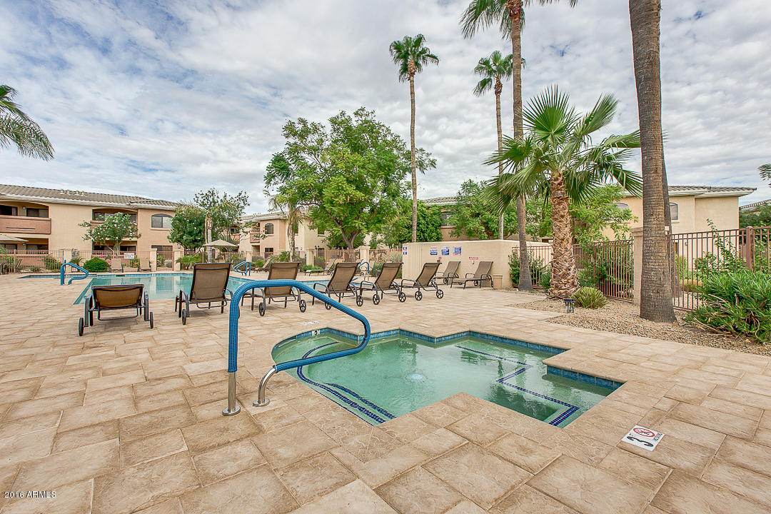 10030 West Indian School Road, Unit 269 Phoenix, AZ 85037 - Photo 30 of 34 a view of a swimming pool with a patio