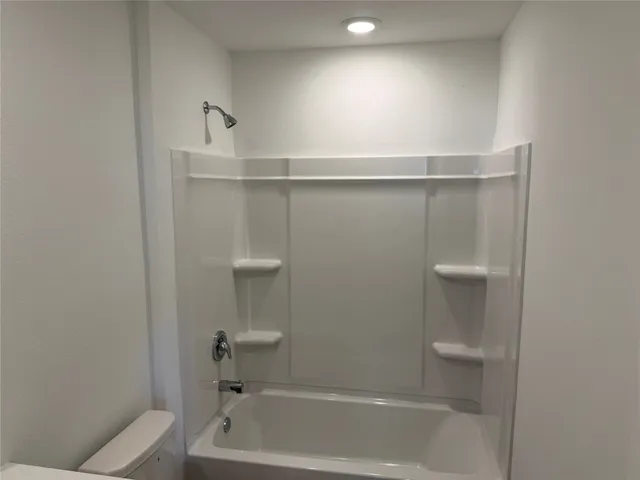 a bathroom with a bathtub