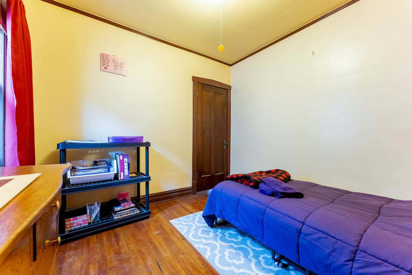 5815 West School Street Chicago, IL 60634 - Photo 14 of 20 a bedroom with a bed and dresser