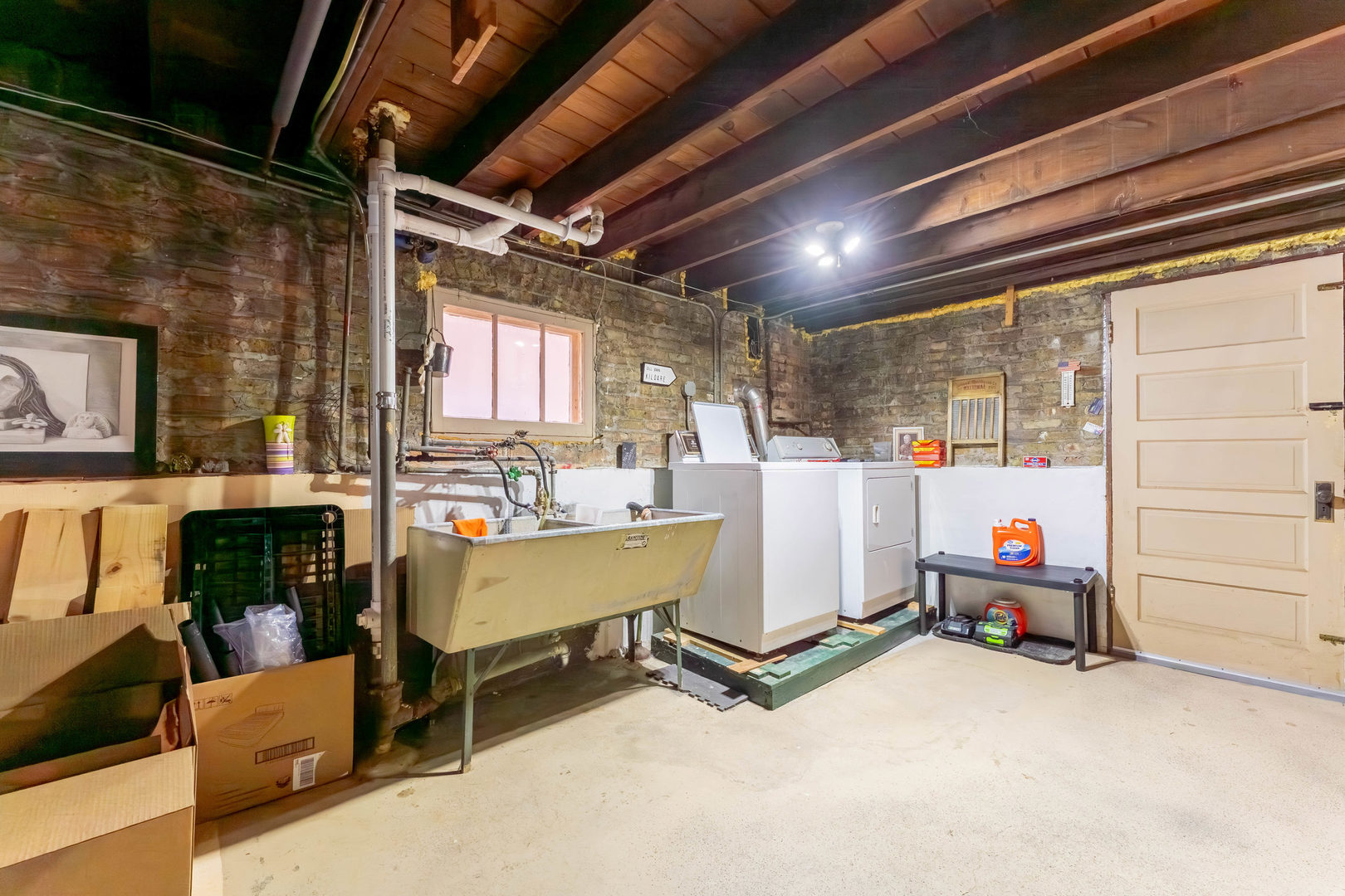 5815 West School Street Chicago, IL 60634 - Photo 16 of 20 a bedroom with furniture and a chandelier