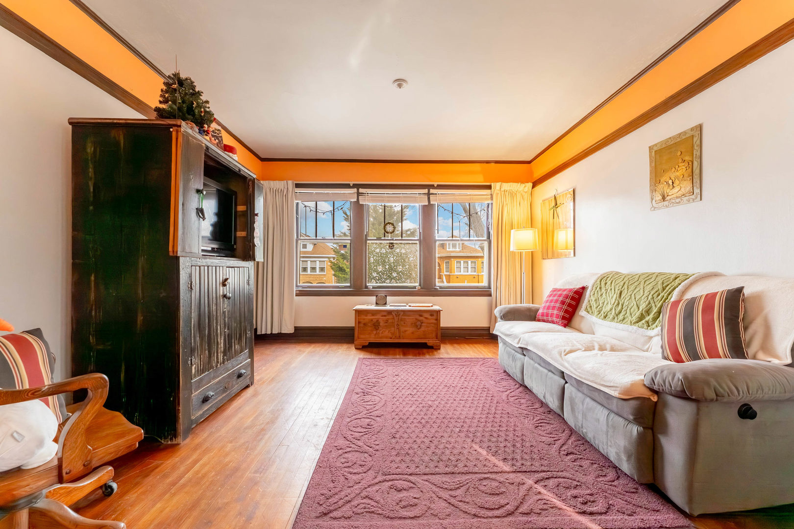 5815 West School Street Chicago, IL 60634 - Photo 4 of 20 a bedroom with furniture and a large window