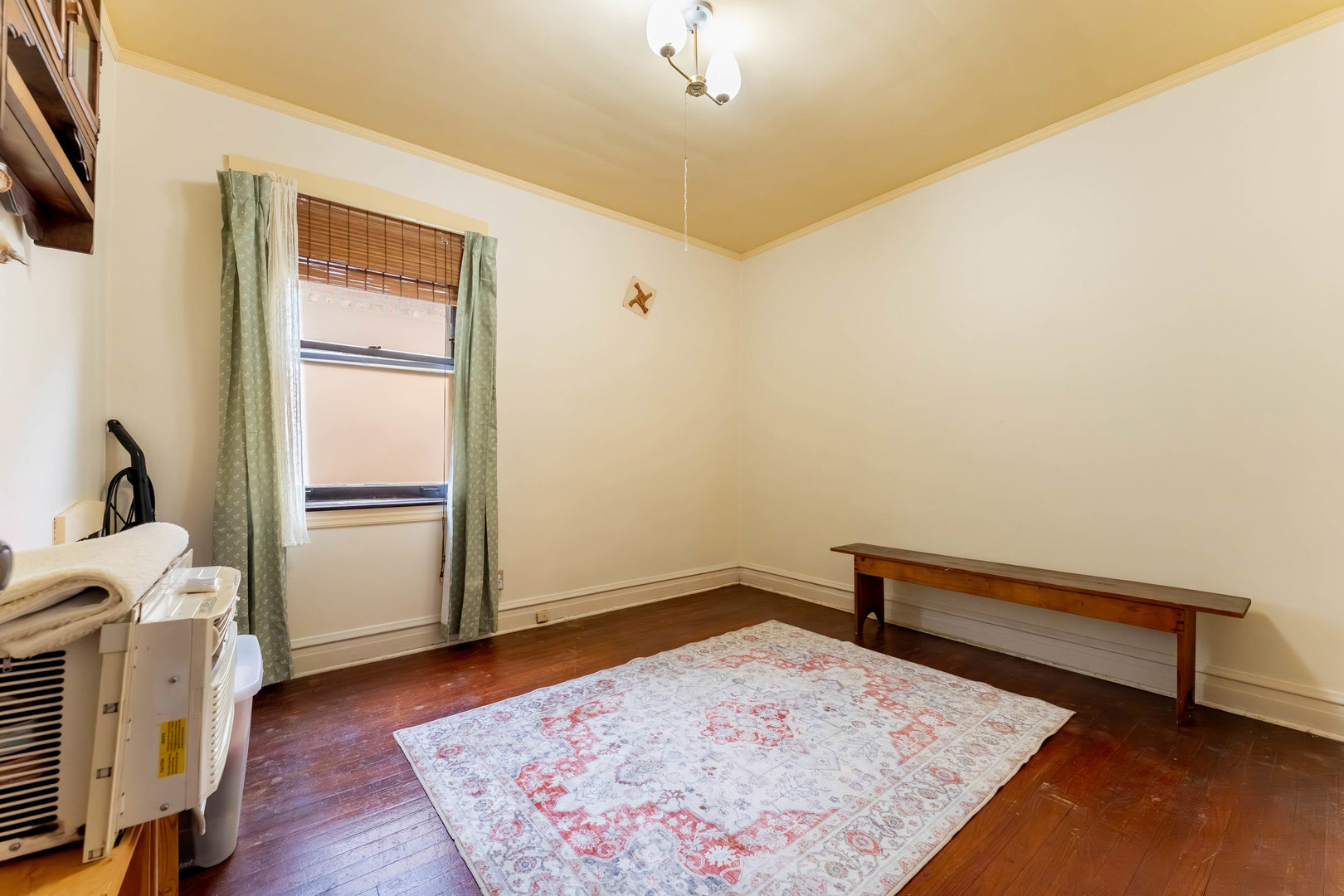 5815 West School Street Chicago, IL 60634 - Photo 10 of 20 a view of a bedroom with wooden floor and bedroom
