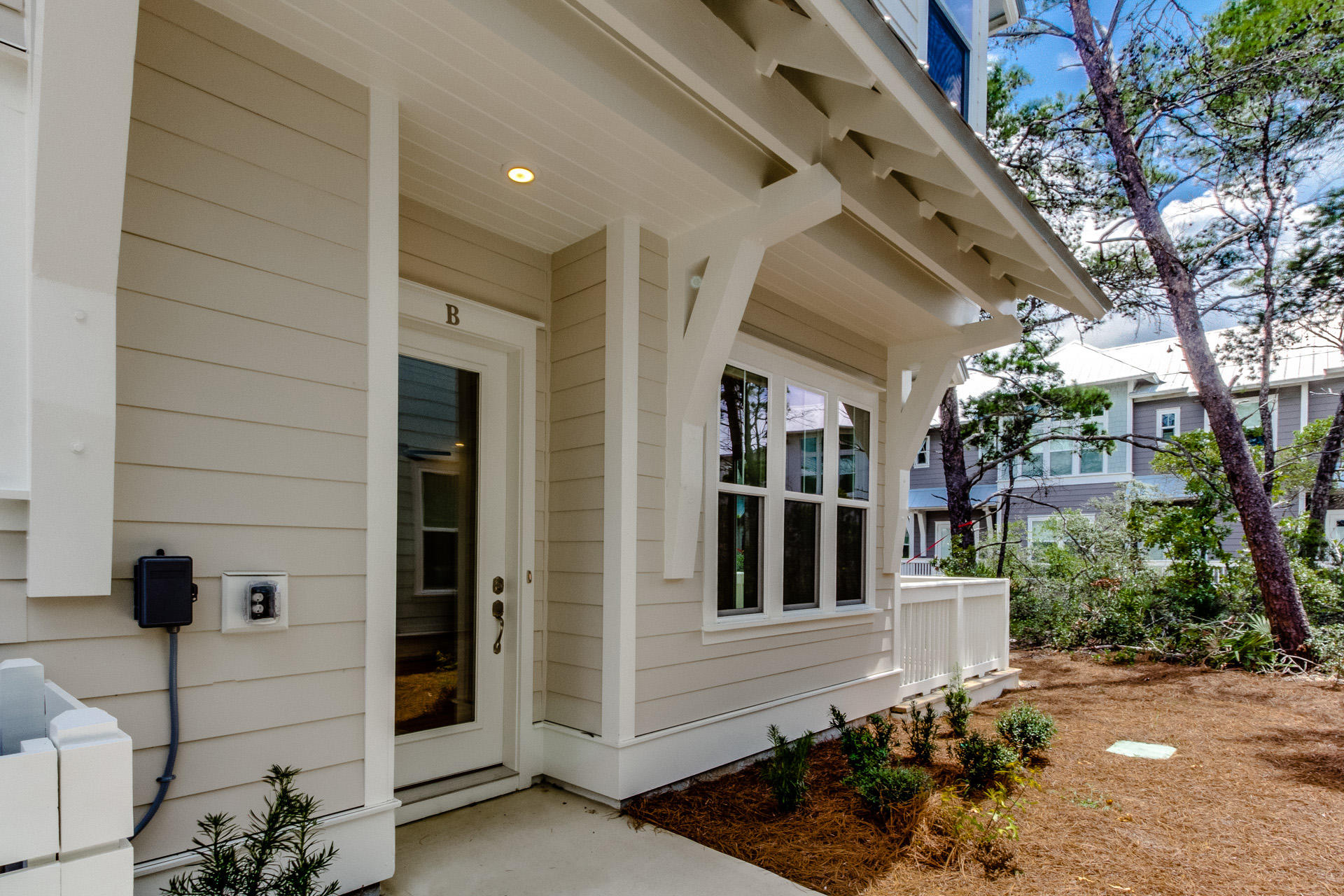 138 Pine Lands Loop Inlet Beach, Unit B Inlet Beach, FL 32461 - Photo 2 of 32 a view of a entryway of the house