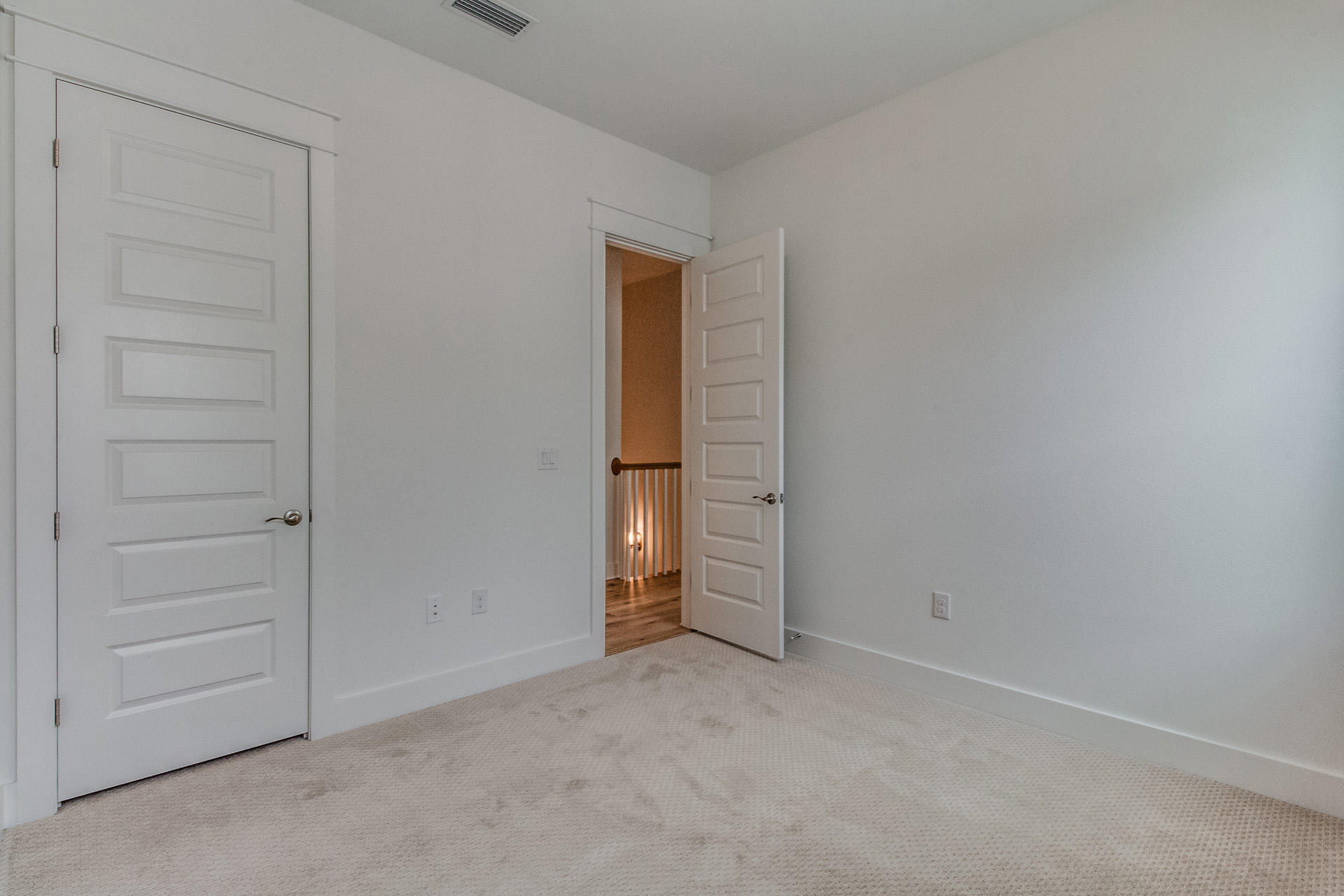 138 Pine Lands Loop Inlet Beach, Unit B Inlet Beach, FL 32461 - Photo 17 of 32 wooden floor and cabinet in a room