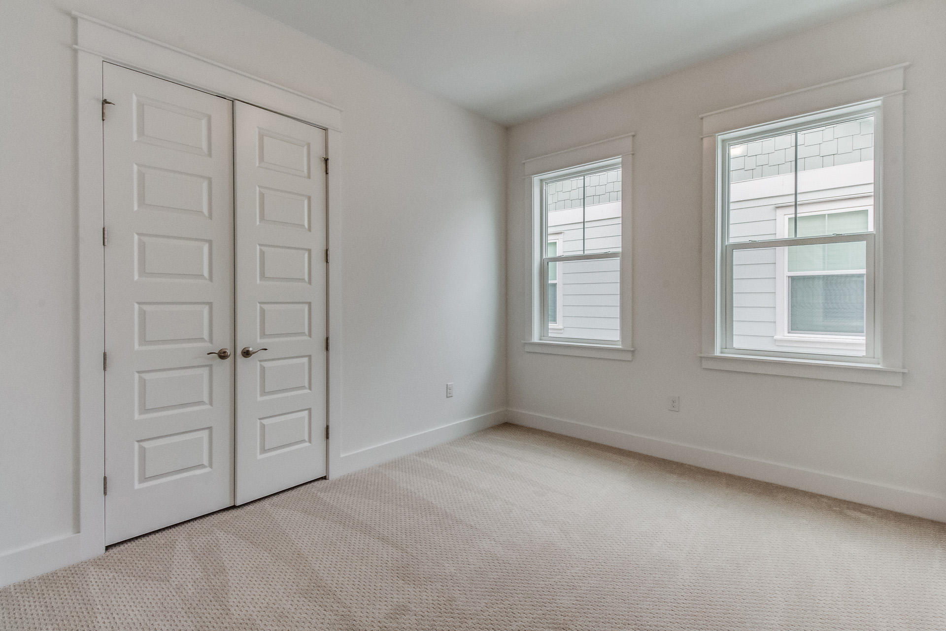 138 Pine Lands Loop Inlet Beach, Unit B Inlet Beach, FL 32461 - Photo 18 of 32 an empty room with windows