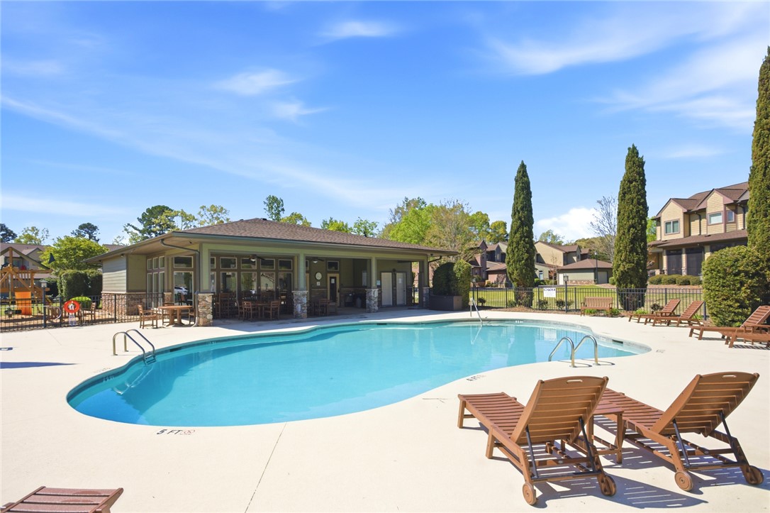 578 Sunset Point Drive West Union, SC 29696 - Photo 41 of 46 This inviting community pool and clubhouse provide an ideal setting for leisure and entertainment.