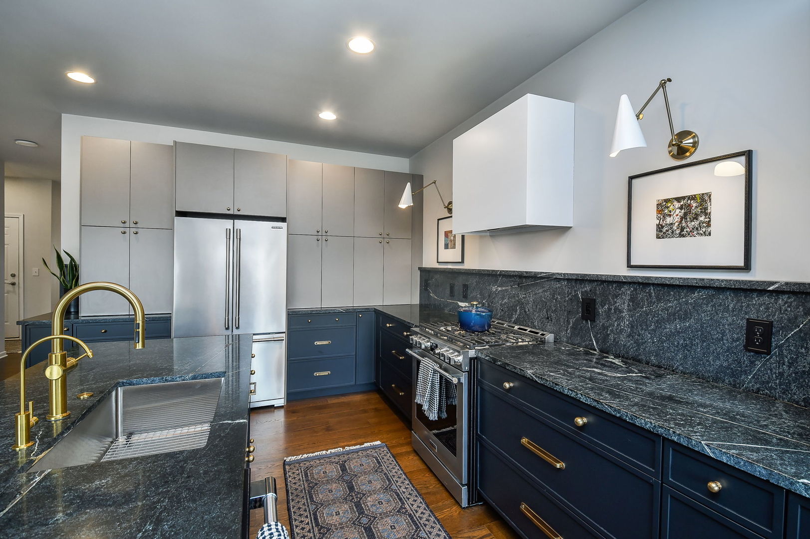 713 Elizabeth Street Elburn, IL 60119 - Photo 11 of 31 a kitchen with stainless steel appliances granite countertop a sink stove and refrigerator