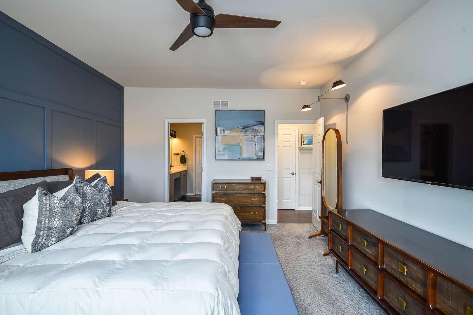713 Elizabeth Street Elburn, IL 60119 - Photo 20 of 31 a bedroom with bed and a flat tv screen on dresser
