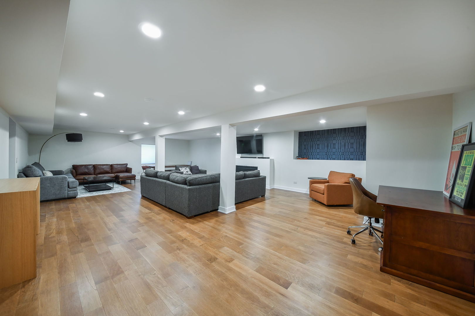 713 Elizabeth Street Elburn, IL 60119 - Photo 23 of 31 a living room with furniture and a flat screen tv