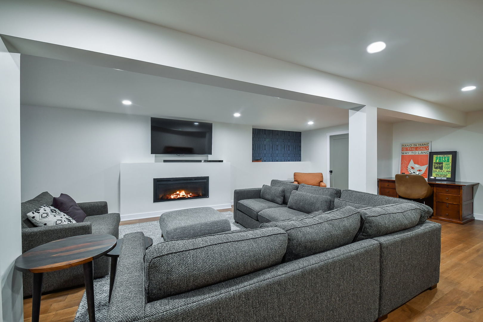 713 Elizabeth Street Elburn, IL 60119 - Photo 24 of 31 a living room with furniture and a fireplace