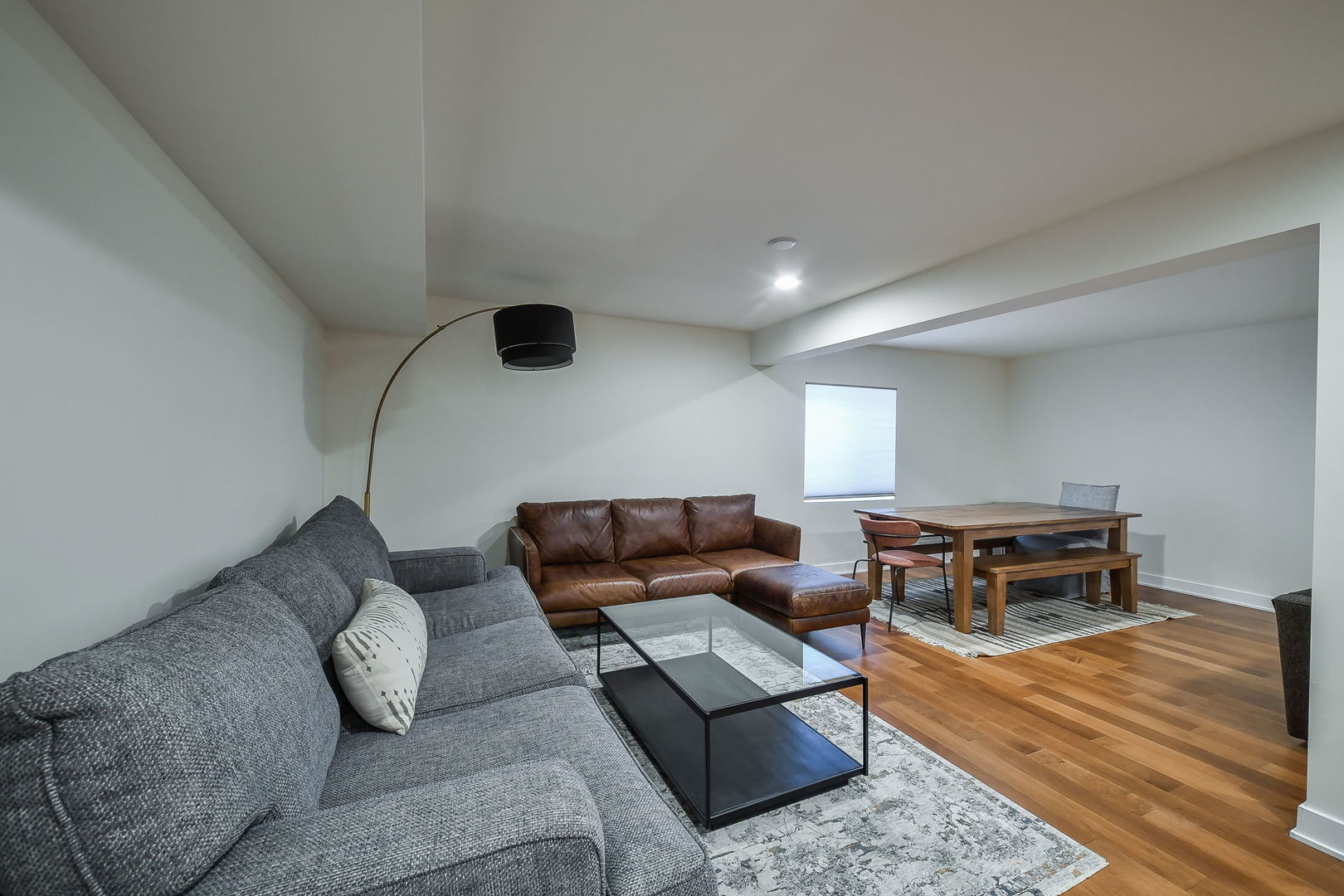 713 Elizabeth Street Elburn, IL 60119 - Photo 25 of 31 a living room with furniture and a rug
