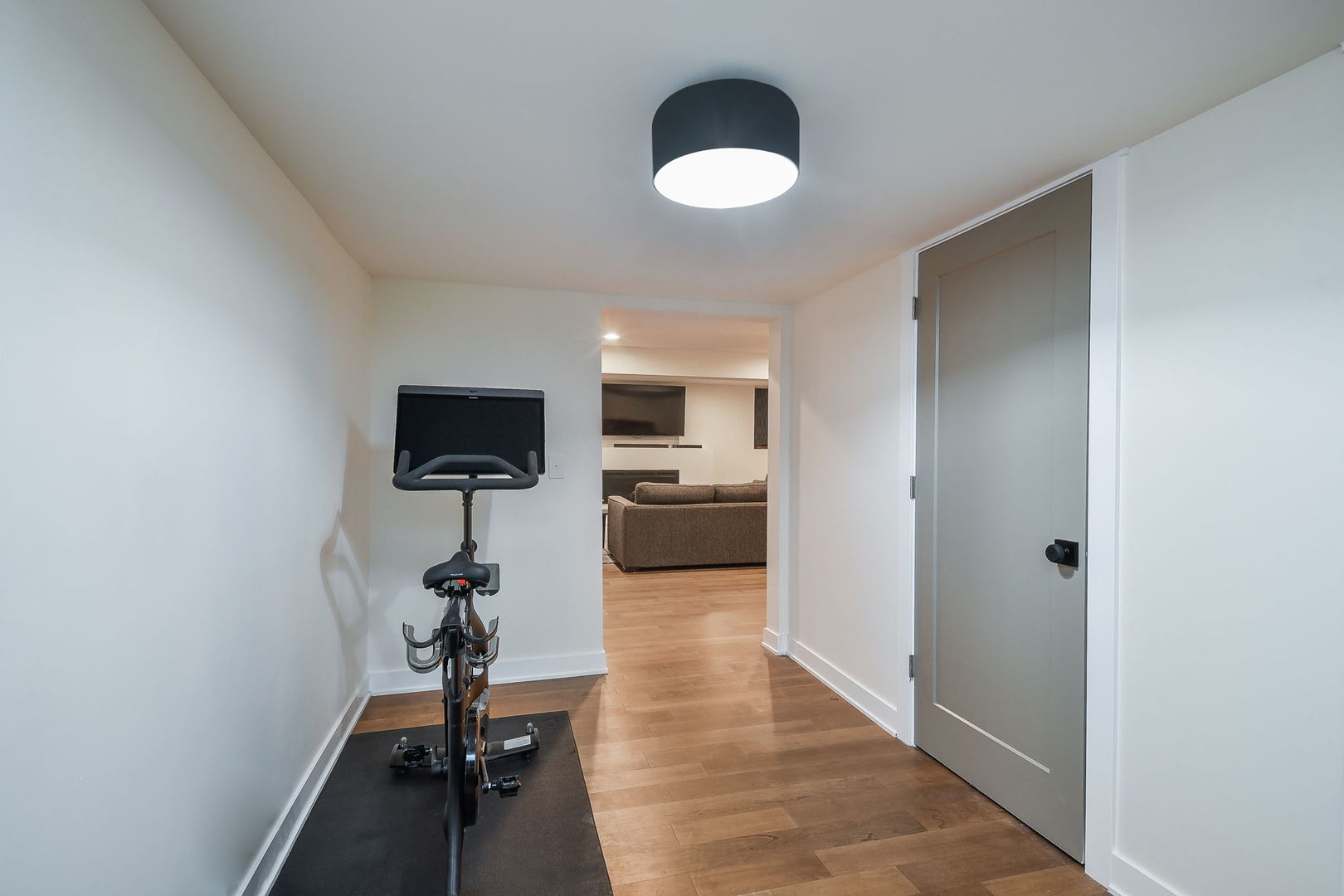 713 Elizabeth Street Elburn, IL 60119 - Photo 26 of 31 a view of a living room and a flat screen tv