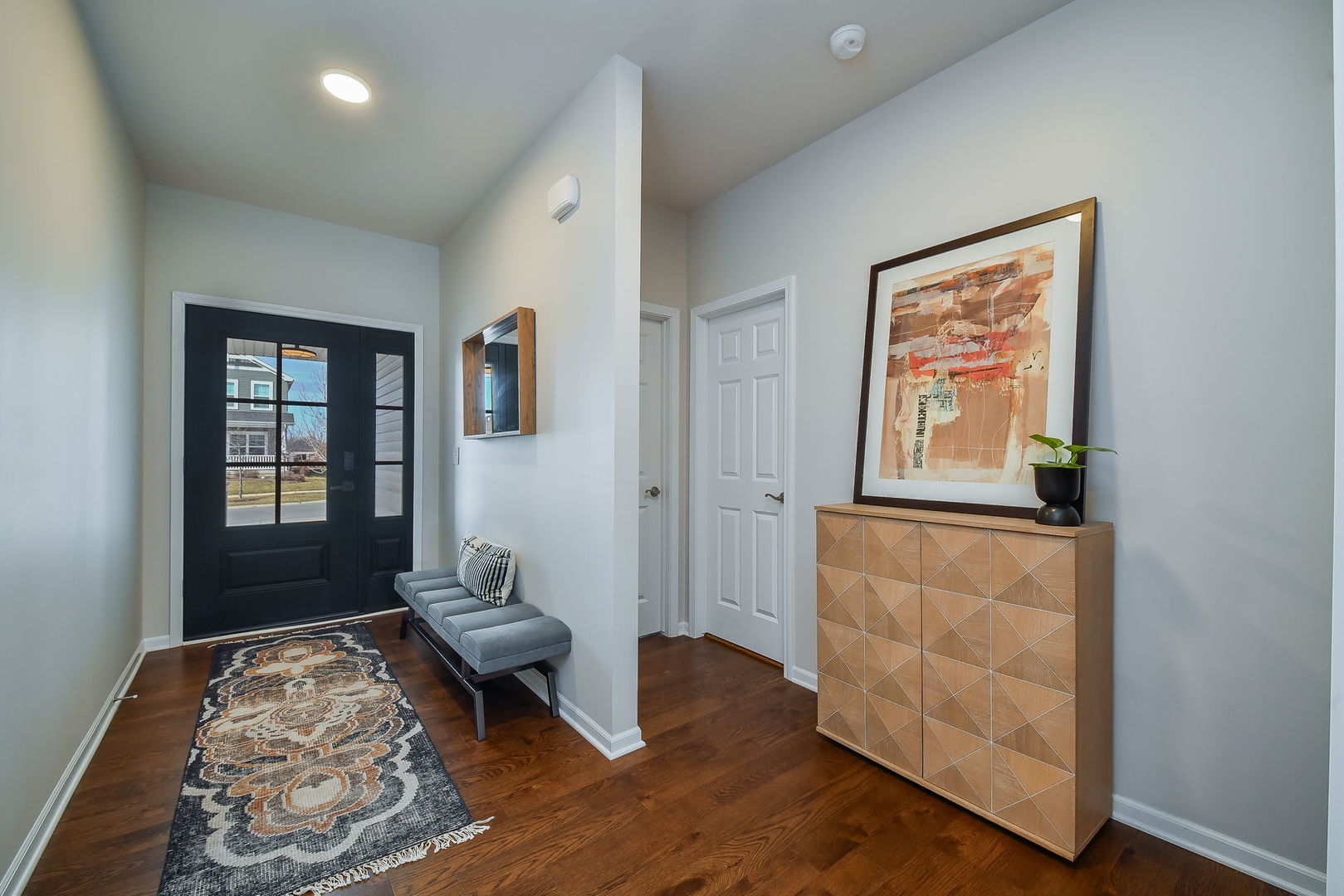 713 Elizabeth Street Elburn, IL 60119 - Photo 3 of 31 a living room with furniture and a window