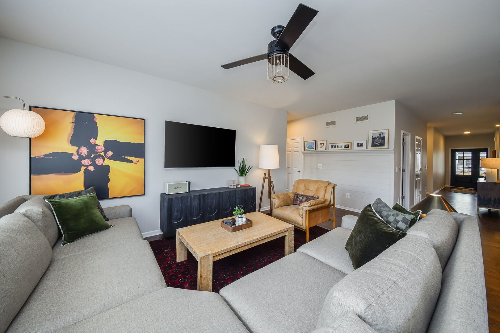 713 Elizabeth Street Elburn, IL 60119 - Photo 4 of 31 a living room with furniture and a flat screen tv