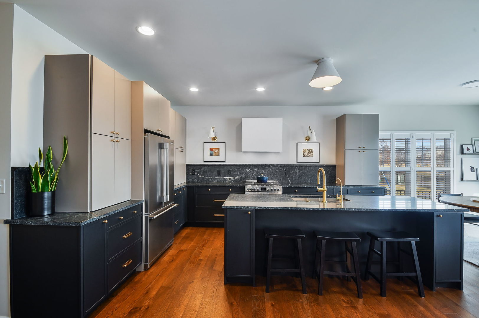 713 Elizabeth Street Elburn, IL 60119 - Photo 9 of 31 a kitchen with stainless steel appliances granite countertop a sink stove and refrigerator