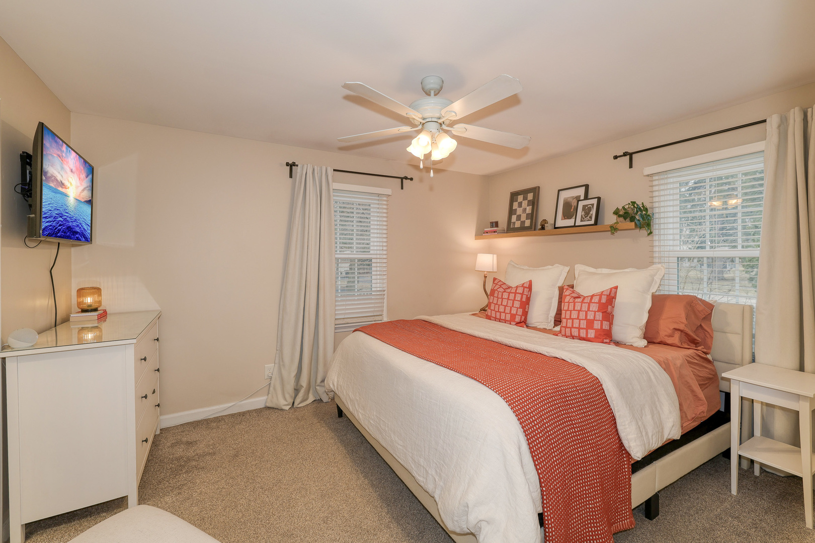 724 South Jefferson Street Batavia, IL 60510 - Photo 13 of 23 a bedroom with a bed and a flat screen tv