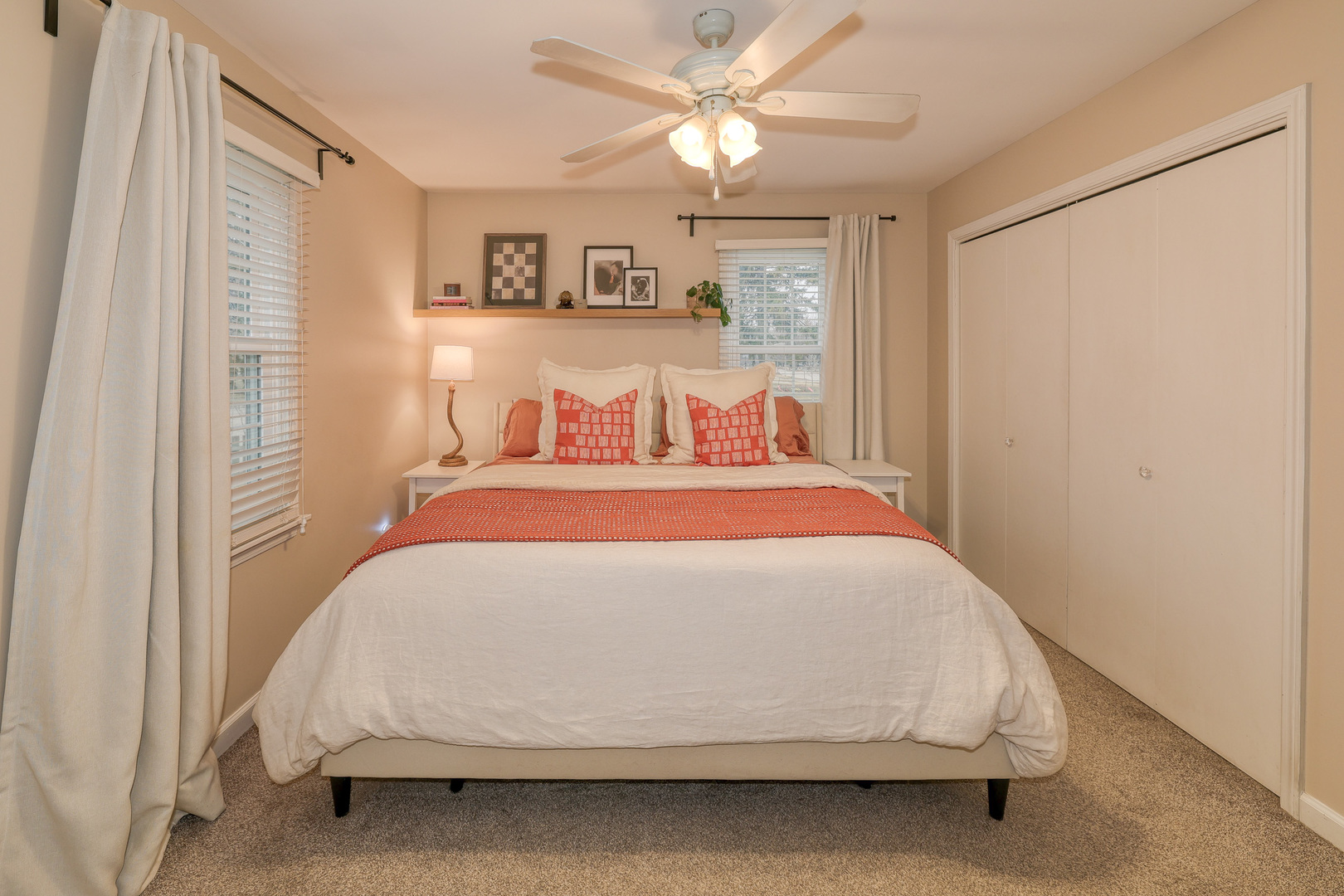 724 South Jefferson Street Batavia, IL 60510 - Photo 14 of 23 a bedroom with a bed and a chandelier