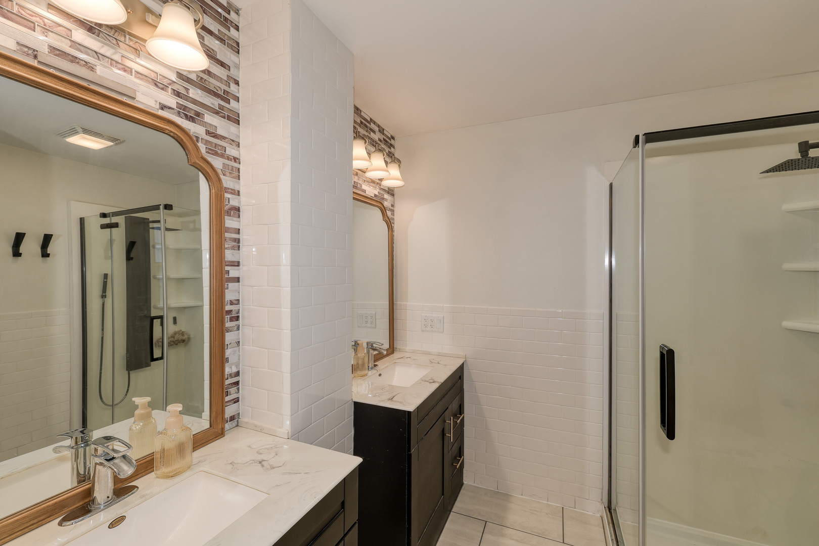 724 South Jefferson Street Batavia, IL 60510 - Photo 15 of 23 a bathroom with a sink vanity and a mirror