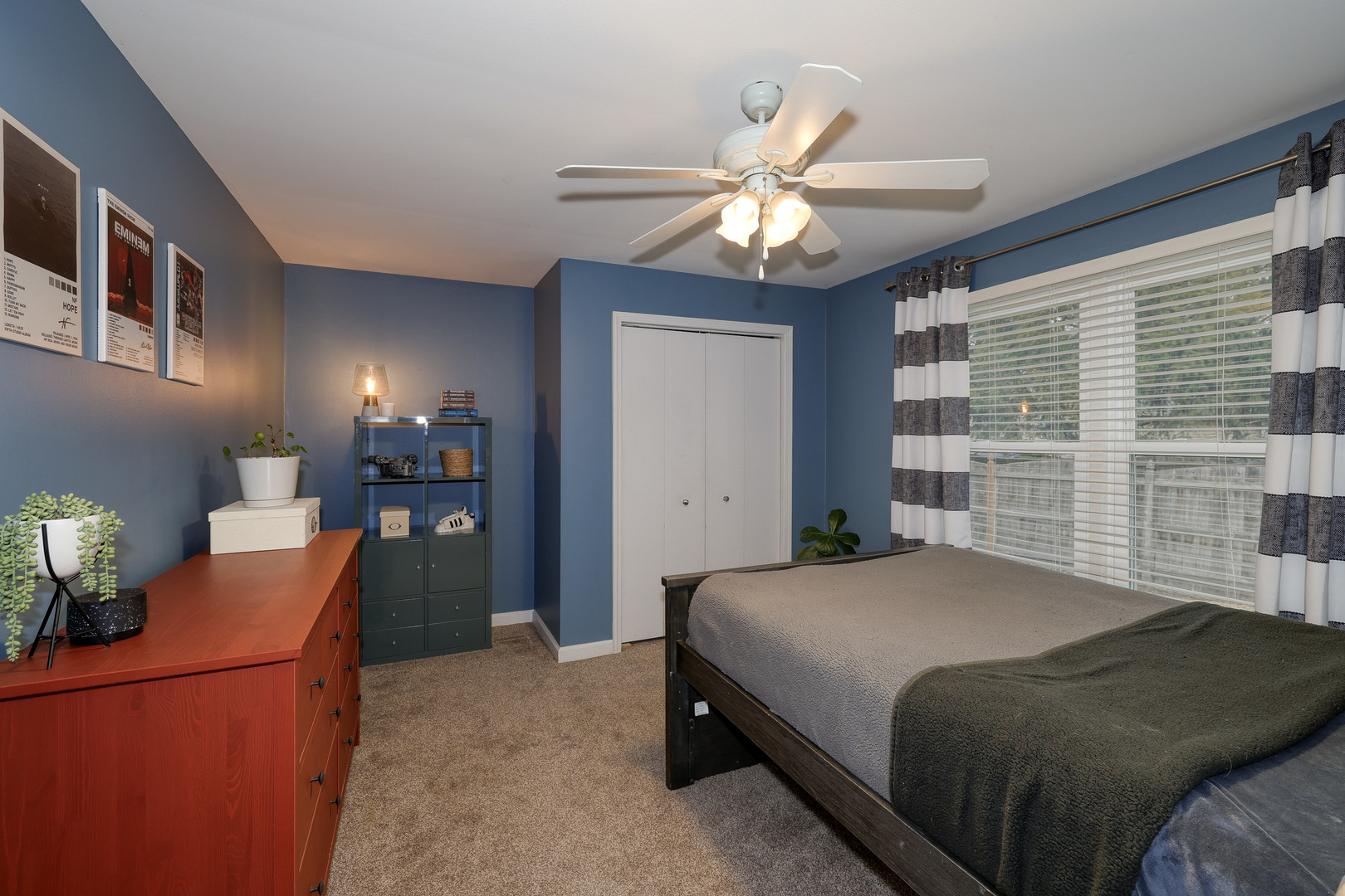 724 South Jefferson Street Batavia, IL 60510 - Photo 9 of 23 a bedroom with a bed and a chandelier