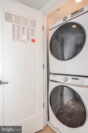 a utility room with a washer and dryer