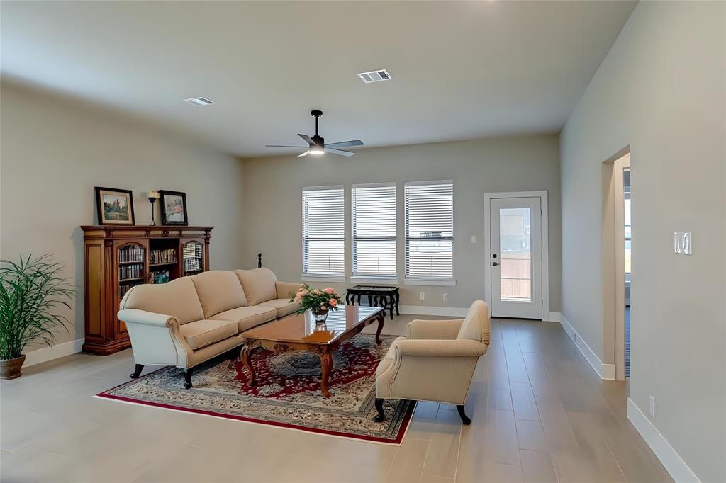 208 Pennington Road Josephine, TX 75173 - Photo 2 of 22 a living room with furniture and a large window