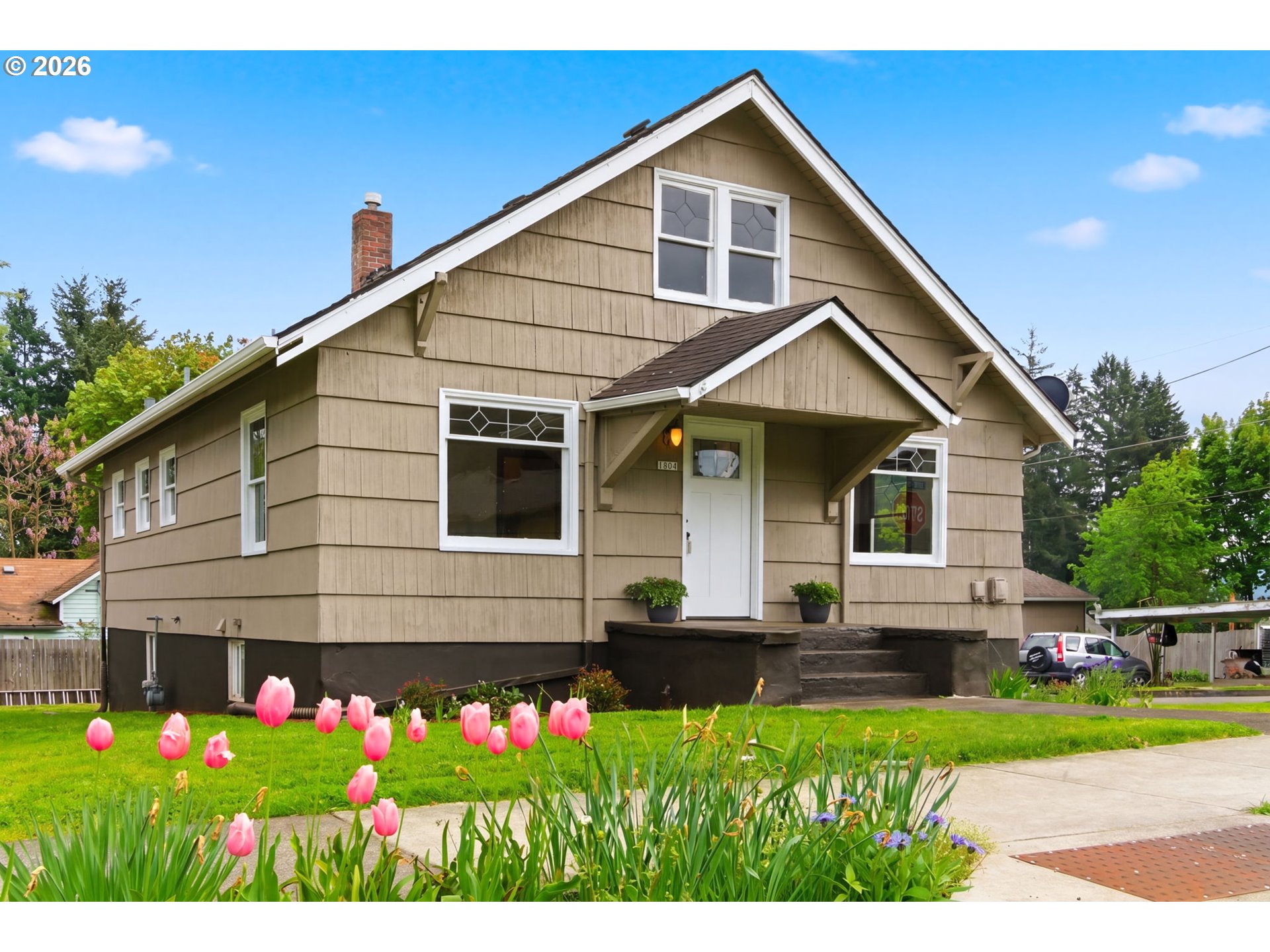 a front view of house with yard