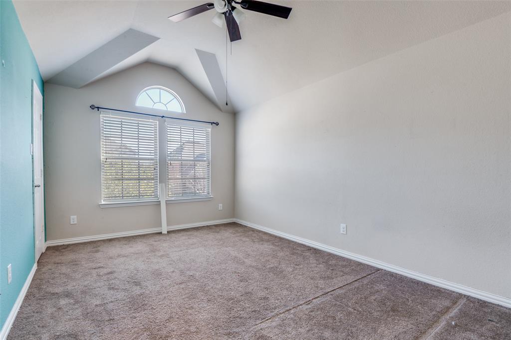 679 Princeton Way Rockwall, TX 75087 - Photo 12 of 25 an empty room with windows